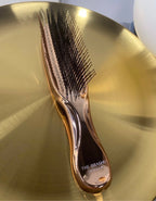 The Rose Gold Scalp Revival Brush